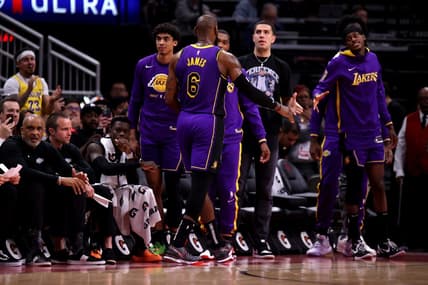 Apr 2, 2023; Houston, Texas, USA; Los Angeles Lakers forward LeBron James (6) shakes hands with teammates on the bench after leaving the game against the Houston Rockets during the fourth quarter at Toyota Center. Mandatory Credit: Erik Williams-USA TODAY Sports