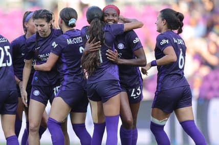 Apr 2, 2023; Orlando, Florida, USA; Orlando Pride forward Messiah Bright (23) celebrates a goal with teammates in the second half against Angel City FC at Exploria Stadium. Mandatory Credit: Cory Knowlton-USA TODAY Sports