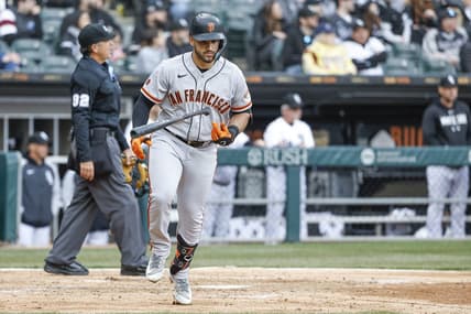 Apr 3, 2023; Chicago, Illinois, USA; San Francisco Giants third baseman David Villar (32) rounds the bases after hitting a solo home run against the Chicago White Sox during the fifth inning at Guaranteed Rate Field. Mandatory Credit: Kamil Krzaczynski-USA TODAY Sports