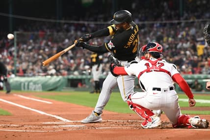 Apr 3, 2023; Boston, Massachusetts, USA; Pittsburgh Pirates right fielder Canaan Smith-Njigba (28) hits a two-run home run against the Boston Red Sox during the first inning at Fenway Park. Mandatory Credit: Brian Fluharty-USA TODAY Sports