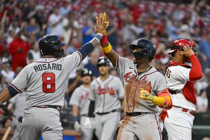 Apr 3, 2023; St. Louis, Missouri, USA;  Atlanta Braves right fielder Ronald Acuna Jr. (13) celebrates with left fielder Eddie Rosario (8) after hitting a three run home run against the St. Louis Cardinals during the second inning at Busch Stadium. Mandatory Credit: Jeff Curry-USA TODAY Sports