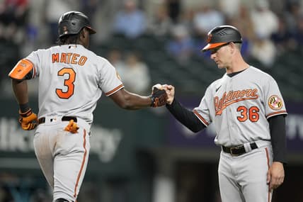 Apr 3, 2023; Arlington, Texas, USA; Baltimore Orioles shortstop Jorge Mateo (3) celebrates his solo home run with third base coach Tony Mansolino (36) against the Texas Rangers during the fifth inning at Globe Life Field. Mandatory Credit: Jim Cowsert-USA TODAY Sports