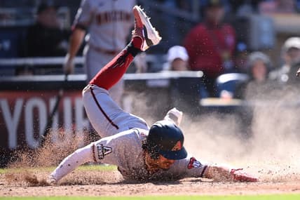 Apr 4, 2023; San Diego, California, USA; Arizona Diamondbacks third baseman Josh Rojas (10) steals home during the eighth inning against the San Diego Padres at Petco Park. Mandatory Credit: Orlando Ramirez-USA TODAY Sports