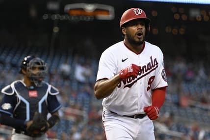 Apr 4, 2023; Washington, District of Columbia, USA; Washington Nationals third baseman Jeimer Candelario (9) reacts after scoring a run against the Tampa Bay Rays during the first inning at Nationals Park. Mandatory Credit: Brad Mills-USA TODAY Sports