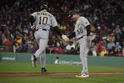 Apr 4, 2023; Boston, Massachusetts, USA;  Pittsburgh Pirates center fielder Bryan Reynolds (10) is congratulated by third base coach Mike Rabelo (58) after hitting a home run during the third inning against the Boston Red Sox at Fenway Park. Mandatory Credit: Bob DeChiara-USA TODAY Sports