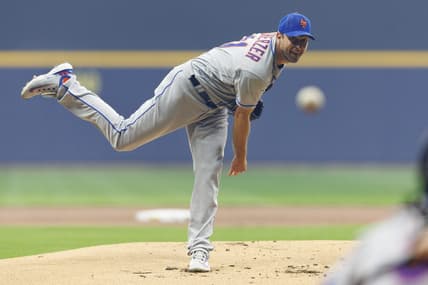 Apr 4, 2023; Milwaukee, Wisconsin, USA;  New York Mets pitcher Max Scherzer (21) throws a pitch during the first inning against the Milwaukee Brewers at American Family Field. Mandatory Credit: Jeff Hanisch-USA TODAY Sports
