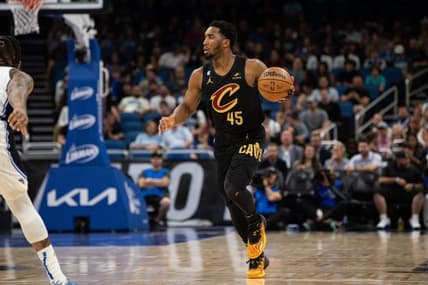 Apr 4, 2023; Orlando, Florida, USA; Cleveland Cavaliers guard Donovan Mitchell looks to pass against the Orlando Magic at Amway Center. Mandatory Credit: Jeremy Reper-USA TODAY Sports