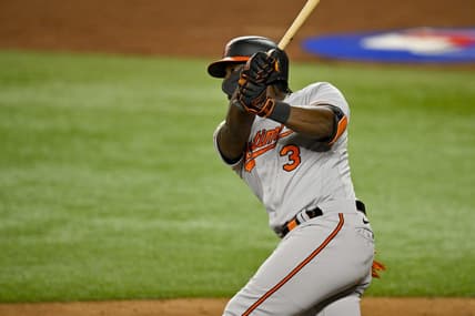 Apr 4, 2023; Arlington, Texas, USA; Baltimore Orioles shortstop Jorge Mateo (3) hits a two run home run against the Texas Rangers during the third inning at Globe Life Field. Mandatory Credit: Jerome Miron-USA TODAY Sports