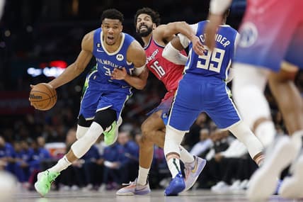 Apr 4, 2023; Washington, District of Columbia, USA; Milwaukee Bucks forward Giannis Antetokounmpo (34) drives to the basket past Washington Wizards forward Anthony Gill (16) in the third quarter at Capital One Arena. Mandatory Credit: Geoff Burke-USA TODAY Sports