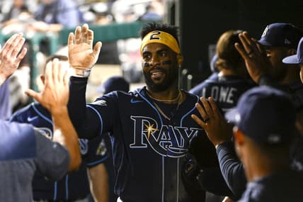 Apr 4, 2023; Washington, District of Columbia, USA; Tampa Bay Rays first baseman Yandy Diaz (2) is congratulated by teammates after scoring a run during the eighth inning against the Washington Nationals at Nationals Park. Mandatory Credit: Brad Mills-USA TODAY Sports