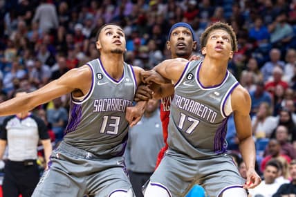 Apr 4, 2023; New Orleans, Louisiana, USA;  Sacramento Kings forward Keegan Murray (13) and forward Kessler Edwards hold back New Orleans Pelicans guard Josh Richardson (2) on a rebound during the second half at Smoothie King Center. Mandatory Credit: Stephen Lew-USA TODAY Sports
