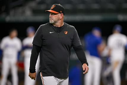 Apr 4, 2023; Arlington, Texas, USA; Baltimore Orioles manager Brandon Hyde (18) walks off the field during the game against the Texas Rangers at Globe Life Field. Mandatory Credit: Jerome Miron-USA TODAY Sports