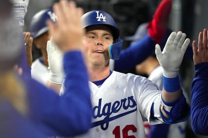 Apr 4, 2023; Los Angeles, California, USA; Los Angeles Dodgers catcher Will Smith (16) celebrates with teammates after hitting a two-run home run in the first inning against the Colorado Rockies at Dodger Stadium. Mandatory Credit: Kirby Lee-USA TODAY Sports