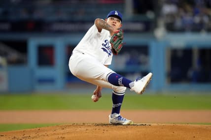 Apr 4, 2023; Los Angeles, California, USA; Los Angeles Dodgers starting pitcher Julio Urias (7) throws in the first inning against the Colorado Rockies at Dodger Stadium. Mandatory Credit: Kirby Lee-USA TODAY Sports