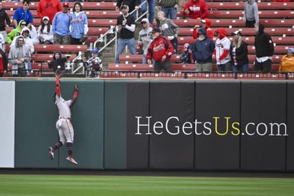 Apr 5, 2023; St. Louis, Missouri, USA;  Atlanta Braves center fielder Michael Harris II (23) leaps at the wall and robs St. Louis Cardinals first baseman Paul Goldschmidt (not pictured) of a two run home run to end the eighth inning at Busch Stadium. Mandatory Credit: Jeff Curry-USA TODAY Sports