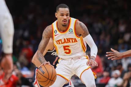 Apr 5, 2023; Atlanta, Georgia, USA; Atlanta Hawks guard Dejounte Murray (5) dribbles against the Washington Wizards in the first half at State Farm Arena. Mandatory Credit: Brett Davis-USA TODAY Sports