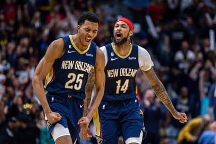 Apr 5, 2023; New Orleans, Louisiana, USA;  New Orleans Pelicans guard Trey Murphy III (25) reacts to making a three point basket with forward Brandon Ingram (14) against the Memphis Grizzlies during the second half at Smoothie King Center. Mandatory Credit: Stephen Lew-USA TODAY Sports