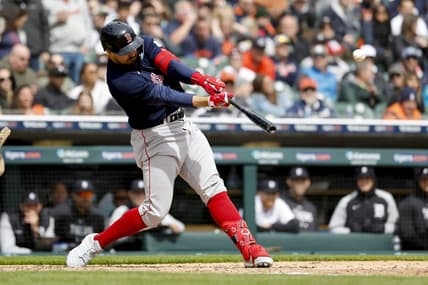 Apr 6, 2023; Detroit, Michigan, USA; Boston Red Sox center fielder Adam Duvall (18) hits a three run home run in the sixth inning against the Detroit Tigers at Comerica Park. Mandatory Credit: Rick Osentoski-USA TODAY Sports