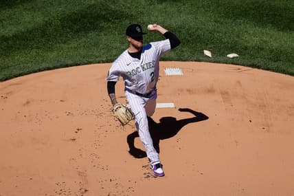 Apr 6, 2023; Denver, Colorado, USA; Colorado Rockies starting pitcher Kyle Freeland (21) delivers a pitch in the first inning against the Washington Nationals at Coors Field. Mandatory Credit: Isaiah J. Downing-USA TODAY Sports
