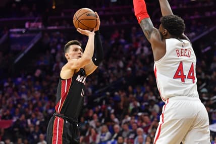 Apr 6, 2023; Philadelphia, Pennsylvania, USA; Miami Heat guard Tyler Herro (14) shoots over Philadelphia 76ers forward Paul Reed (44) during the first quarter at Wells Fargo Center. Mandatory Credit: Eric Hartline-USA TODAY Sports