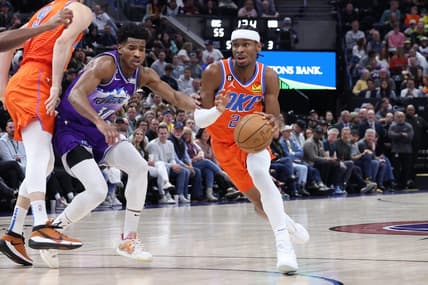 Apr 6, 2023; Salt Lake City, Utah, USA; Oklahoma City Thunder guard Shai Gilgeous-Alexander (2) moves past Utah Jazz guard Ochai Agbaji (30) in the second quarter at Vivint Arena. Mandatory Credit: Rob Gray-USA TODAY Sports