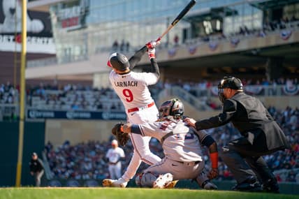 Apr 7, 2023; Minneapolis, Minnesota, USA; Minnesota Twins left fielder Trevor Larnach (9) strikes out against Houston Astros starting pitcher Jose Urquidy (not pictured) in the first inning at Target Field. Mandatory Credit: Matt Blewett-USA TODAY Sports