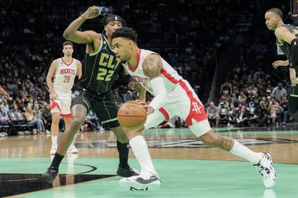 Apr 7, 2023; Charlotte, North Carolina, USA;Houston Rockets forward Kenyon Martin Jr. (6) drives to the basket against Charlotte Hornets forward Xavier Sneed (22) during the second quarter at the Spectrum Center. Mandatory Credit: Jim Dedmon-USA TODAY Sports