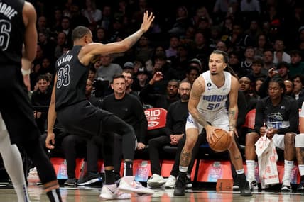 Apr 7, 2023; Brooklyn, New York, USA; Orlando Magic guard Cole Anthony (50) looks to shoot the ball against Brooklyn Nets center Nic Claxton (33) during the second quarter at Barclays Center. Mandatory Credit: Brad Penner-USA TODAY Sports