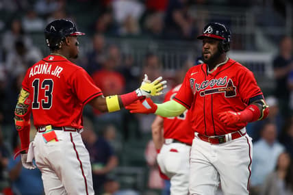 Apr 7, 2023; Atlanta, Georgia, USA; Atlanta Braves left fielder Marcell Ozuna (20) celebrates after a home run with right fielder Ronald Acuna Jr. (13) against the San Diego Padres in the third inning at Truist Park. Mandatory Credit: Brett Davis-USA TODAY Sports