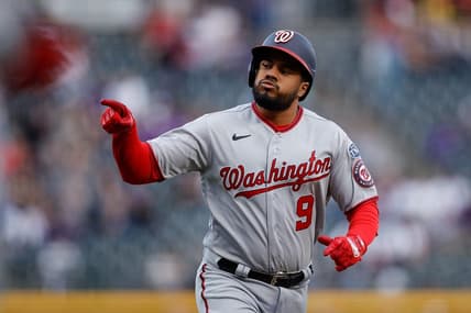 Apr 7, 2023; Denver, Colorado, USA; Washington Nationals third baseman Jeimer Candelario (9) gestures as he rounds the bases on a solo home run in the first inning against the Colorado Rockies at Coors Field. Mandatory Credit: Isaiah J. Downing-USA TODAY Sports