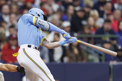 Apr 7, 2023; Milwaukee, Wisconsin, USA;  Milwaukee Brewers center fielder Garrett Mitchell (5) this an RBI single during the third inning against the St. Louis Cardinals at American Family Field. Mandatory Credit: Jeff Hanisch-USA TODAY Sports