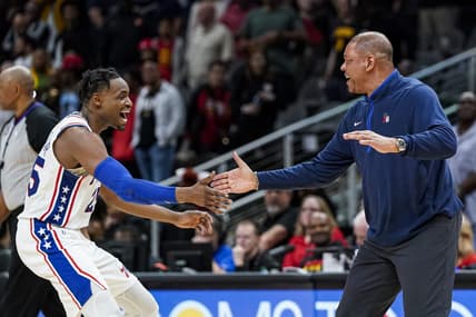 Apr 7, 2023; Atlanta, Georgia, USA;  Philadelphia 76ers forward Danuel House Jr. (25) and head coach Glenn Rivers react during a timeout during the game against the Atlanta Hawks during overtime at State Farm Arena. Mandatory Credit: Dale Zanine-USA TODAY Sports