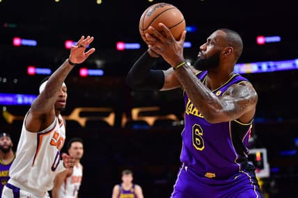 Apr 7, 2023; Los Angeles, California, USA; Los Angeles Lakers forward LeBron James (6) shoots against Phoenix Suns forward Torrey Craig (0) during the first half at Crypto.com Arena. Mandatory Credit: Gary A. Vasquez-USA TODAY Sports