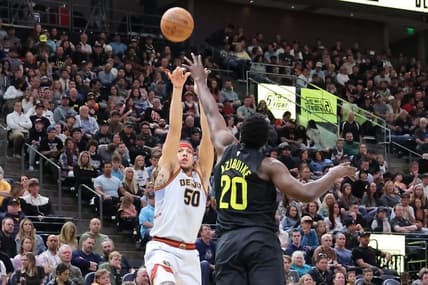 Apr 8, 2023; Salt Lake City, Utah, USA; Denver Nuggets forward Aaron Gordon (50) shoots over Utah Jazz center Udoka Azubuike (20) in the second quarter at Vivint Arena. Mandatory Credit: Rob Gray-USA TODAY Sports