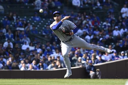 Apr 8, 2023; Chicago, Illinois, USA;  Texas Rangers shortstop Corey Seager (5) throws to first base on a single hit by Chicago Cubs shortstop Dansby Swanson (not pictured) during the first inning at Wrigley Field. Mandatory Credit: Matt Marton-USA TODAY Sports
