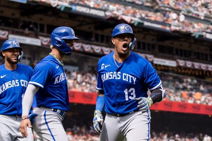 Apr 8, 2023; San Francisco, California, USA;  Kansas City Royals catcher Salvador Perez (13) is congratulated by right fielder MJ Melendez (1) after hitting a three-run home run against the San Francisco Giants during the eighth inning at Oracle Park. Mandatory Credit: John Hefti-USA TODAY Sports