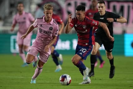 Apr 8, 2023; Fort Lauderdale, Florida, USA; FC Dallas forward Alan Velasco (20) and Inter Miami midfielder Bryce Duke (8) battle for the ball during the first half at DRV PNK Stadium. Mandatory Credit: Eric Espada-USA TODAY Sports
