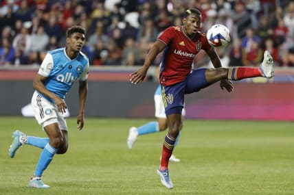 Apr 8, 2023; Sandy, Utah, USA; Real Salt Lake midfielder Anderson Julio (29) looks to control the ball against Charlotte FC defender Adilson Malanda (29) in the first half at America First Field. Mandatory Credit: Jeffrey Swinger-USA TODAY Sports