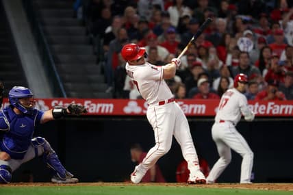 Apr 8, 2023; Anaheim, California, USA;  Los Angeles Angels center fielder Mike Trout (27) hits a 3-run home run during the fifth inning against the Toronto Blue Jays at Angel Stadium. Mandatory Credit: Kiyoshi Mio-USA TODAY Sports