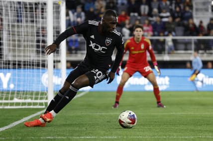 Apr 8, 2023; Washington, District of Columbia, USA; D.C. United forward Christian Benteke (20) dribbles the ball during the second half at Audi Field. Mandatory Credit: Geoff Burke-USA TODAY Sports