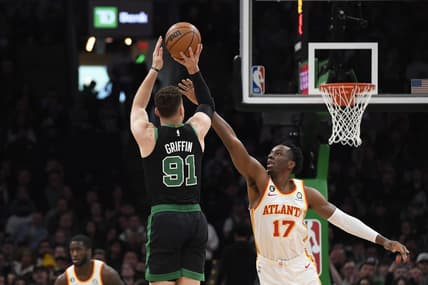 Apr 9, 2023; Boston, Massachusetts, USA; Boston Celtics forward Blake Griffin (91) shoots the ball over Atlanta Hawks forward Onyeka Okongwu (17) during the first half at TD Garden. Mandatory Credit: Bob DeChiara-USA TODAY Sports