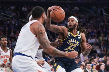 Apr 9, 2023; New York, New York, USA; Indiana Pacers forward Isaiah Jackson (22) goes ti the basket against New York Knicks center Mitchell Robinson (23) and forward Obi Toppin (1) during the first quarter at Madison Square Garden. Mandatory Credit: Vincent Carchietta-USA TODAY Sports