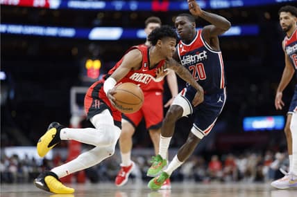 Apr 9, 2023; Washington, District of Columbia, USA; Houston Rockets guard Jalen Green (4) dribbles the ball as Washington Wizards guard Kendrick Nunn (20) defends in the second quarterat Capital One Arena. Mandatory Credit: Geoff Burke-USA TODAY Sports