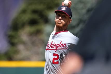 Apr 9, 2023; Denver, Colorado, USA; Washington Nationals starting pitcher Chad Kuhl (26) delivers a pitch in the first inning against the Colorado Rockies at Coors Field. Mandatory Credit: Ron Chenoy-USA TODAY Sports