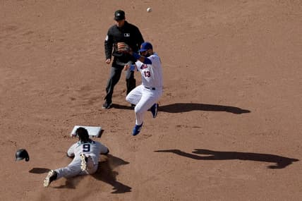 Apr 9, 2023; New York City, New York, USA; Miami Marlins third baseman Jean Segura (9) steals second base as the throw goes over New York Mets second baseman Luis Guillorme (13) allowing Segura to take third base during the eighth inning at Citi Field. Mandatory Credit: Brad Penner-USA TODAY Sports