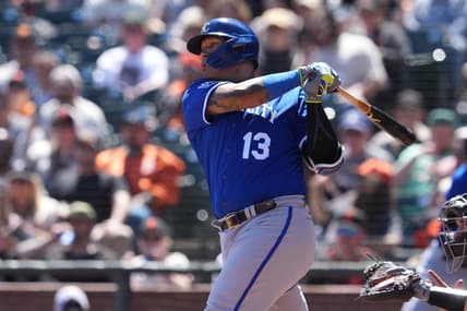 Apr 9, 2023; San Francisco, California, USA; Kansas City Royals designated hitter Salvador Perez (13) hits an RBI single against the San Francisco Giants during the fourth inning at Oracle Park. Mandatory Credit: Darren Yamashita-USA TODAY Sports