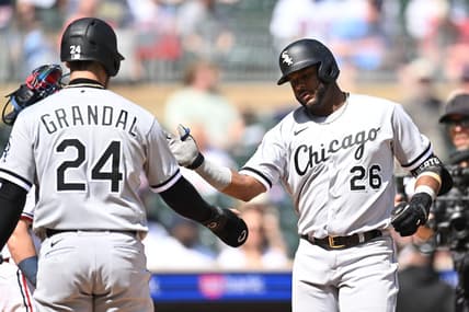 Apr 10, 2023; Minneapolis, Minnesota, USA; Chicago White Sox shortstop Hanser Alberto (26) celebrates with catcher Yasmani Grandal (24) after hitting a three run home run against Minnesota Twins starting pitcher Kenta Maeda (not pictured) during the fourth inning at Target Field. Mandatory Credit: Jeffrey Becker-USA TODAY Sports