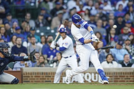 Apr 10, 2023; Chicago, Illinois, USA; Chicago Cubs third baseman Patrick Wisdom (16) breaks his bat as he bats against the Seattle Mariners during the second inning at Wrigley Field. Mandatory Credit: Kamil Krzaczynski-USA TODAY Sports