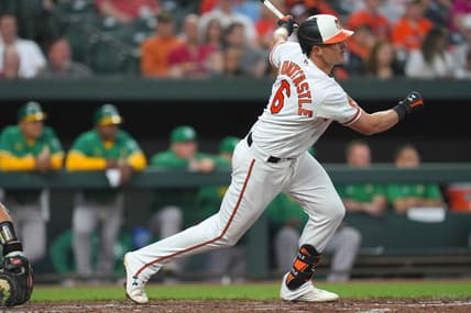 Apr 11, 2023; Baltimore, Maryland, USA; Baltimore Orioles first baseman Ryan Mountcastle (6) drives home shortstop Jorge Mateo (not shown) in the third inning against the Oakland Athletics at Oriole Park at Camden Yards. Mandatory Credit: Mitch Stringer-USA TODAY Sports