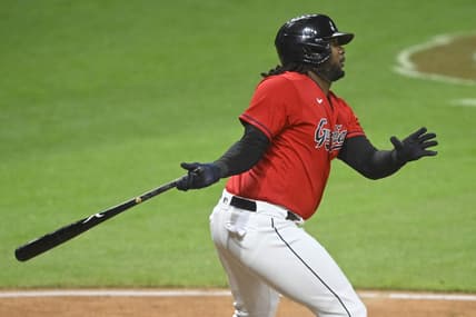 Apr 11, 2023; Cleveland, Ohio, USA; Cleveland Guardians designated hitter Josh Bell (55) doubles in the ninth inning against the New York Yankees at Progressive Field. Mandatory Credit: David Richard-USA TODAY Sports